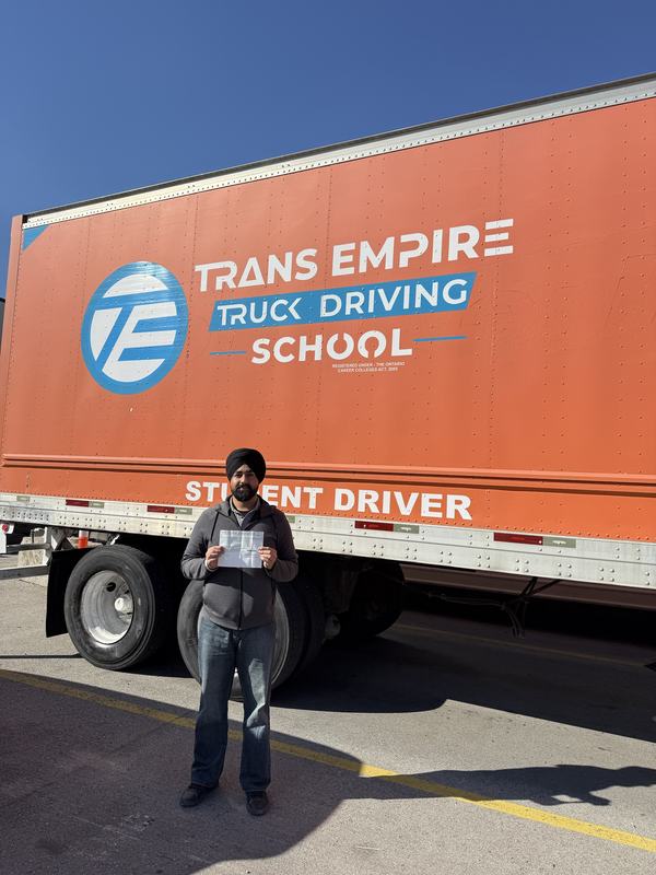 Trans Empire Truck Driving School graduate with their certificate