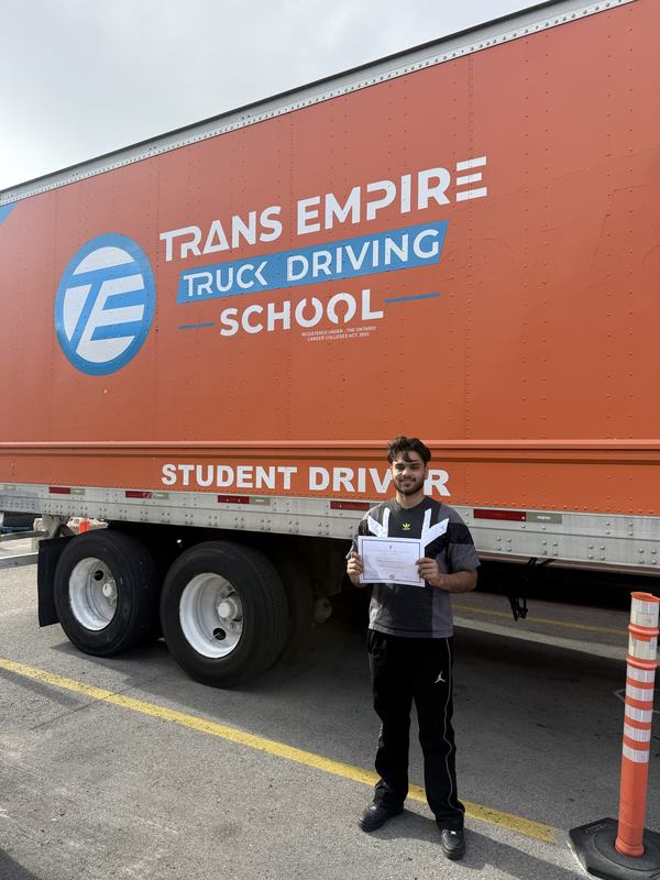 Trans Empire Truck Driving School graduate with their certificate